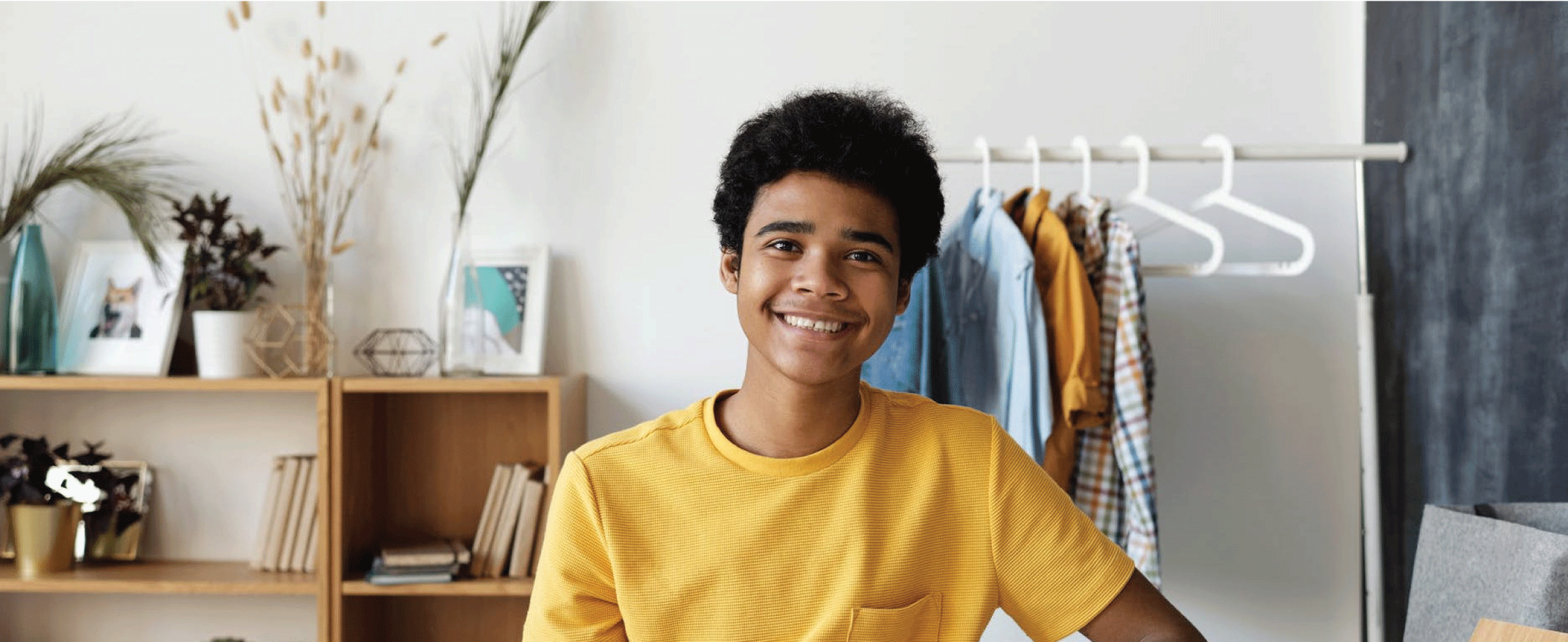 Student smiling at the camera ready to learn